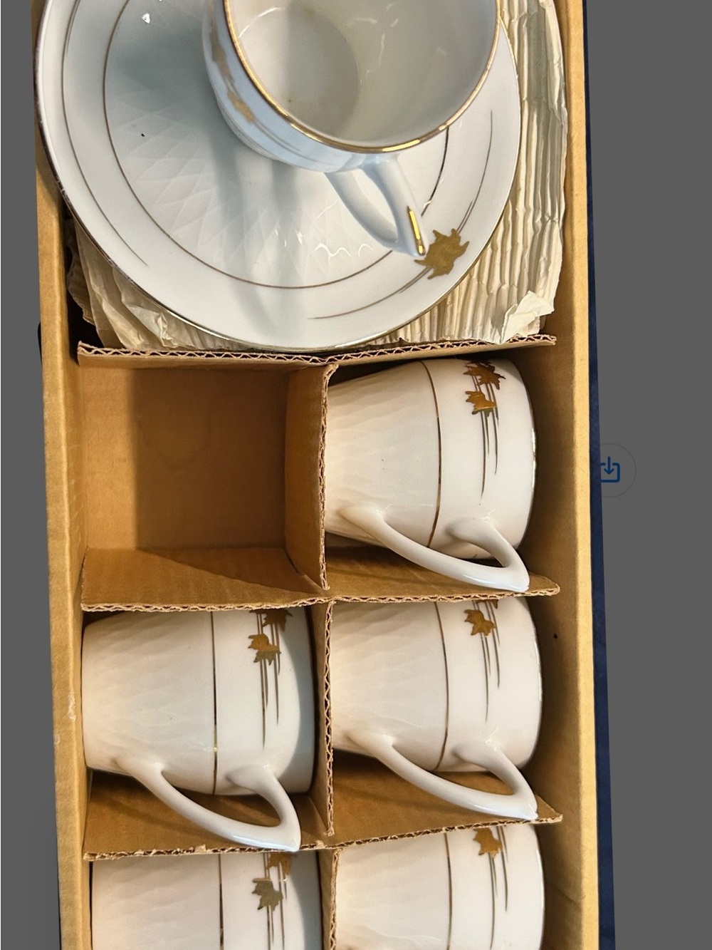 Elegant White and Gold Porcelain Teacup and Saucer Set. Six cups and saucers.